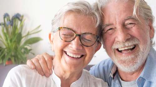 mand and woman smiling