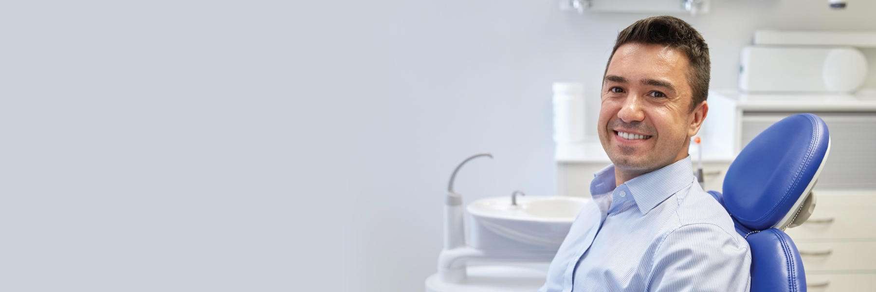 troy man smiling in dental chair